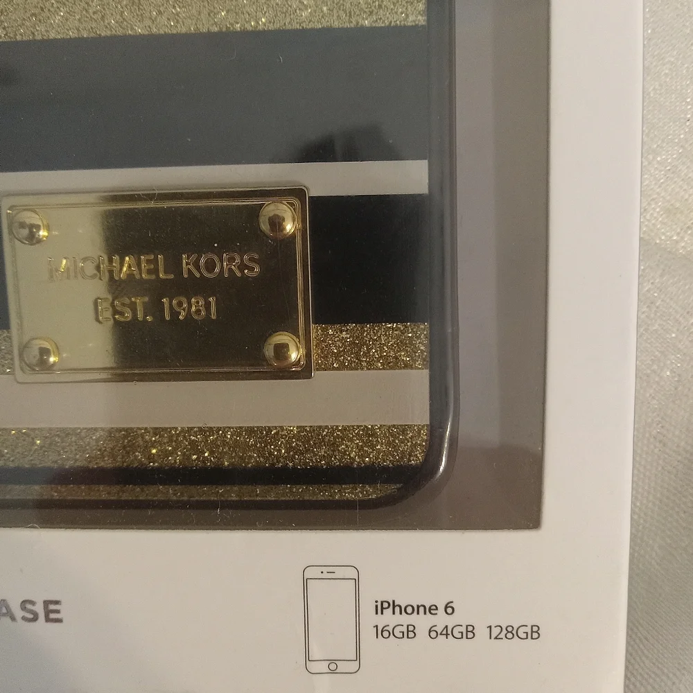 Michael Kors gold glitter white black Apple I phone 6 case.